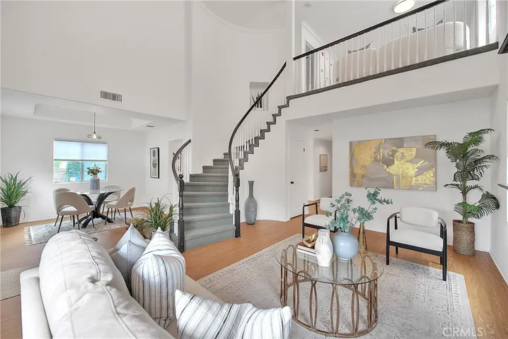 Living room with 20 feet high ceiling