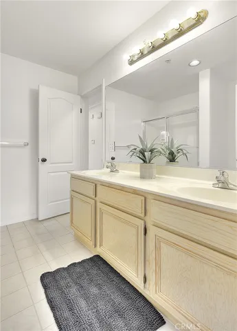 Hallway Bathroom with double sinks