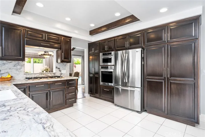 The efficient layout flows seamlessly into the beautiful kitchen!