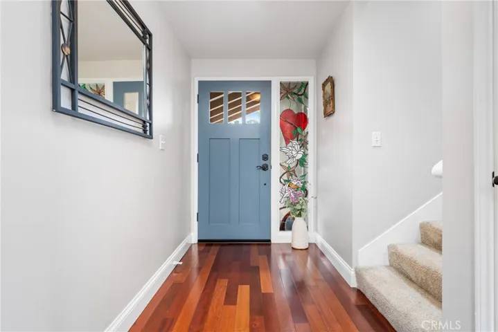 Entering the home, you are greeted by Brazilian wood floors that expand throughout parts of the downstairs of the home!
