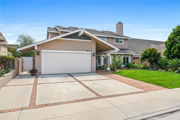 Large driveway w/ room to park toys 
and a 2-car attached garage!