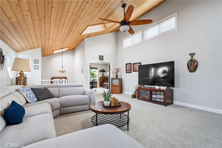 Enjoy the spaciousness of the large bonus room with vaulted ceilings and cedar paneling.
