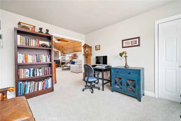 The office/5th bedroom features dual closets with built-ins for ample storage.
