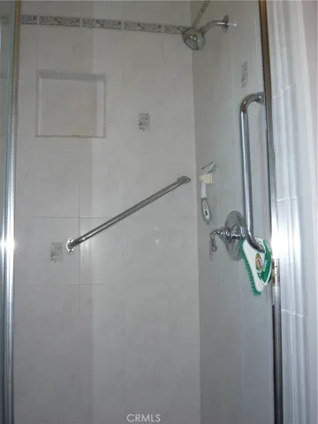 large walk-in shower in primary bathroom