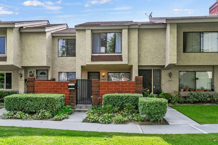 Private front patio facing greenbelt.  Great interior location away from the street.