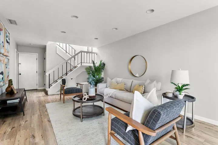 Living room with direct access to 2-car garage at rear.
