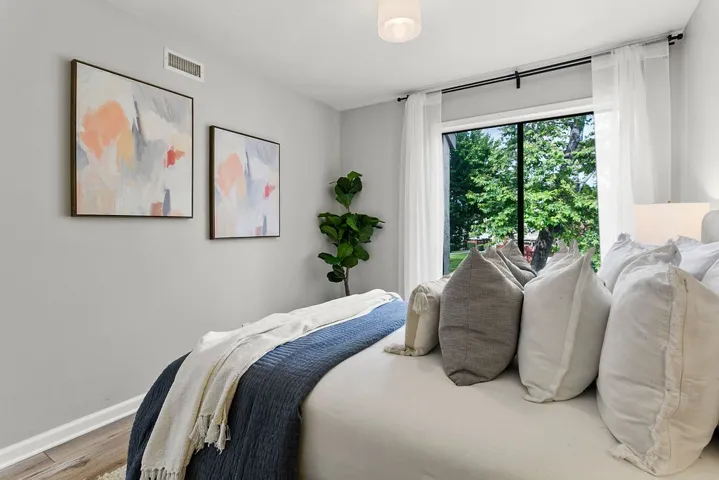 Bedroom #2 with view over greenbelt.
