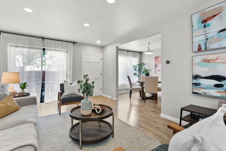 Living room with view of dining area.
