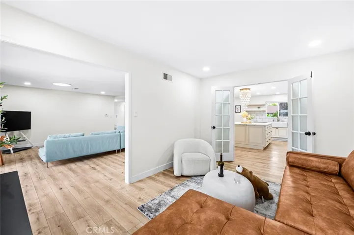 Den opens to Living Room