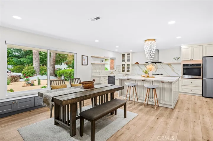 Dining with built-in cabinets under window