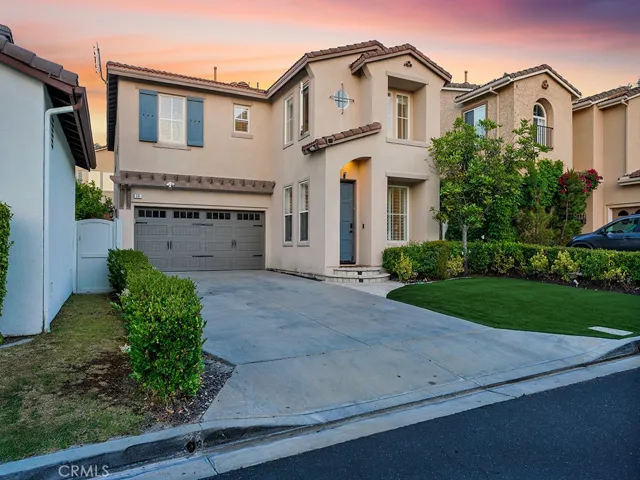 HUGE driveway can accommodate 4 cars plus 2 in the garage