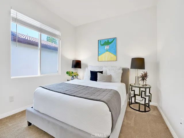 Bedroom #4 light and bright with large closet, freshly painted with plush carpet.