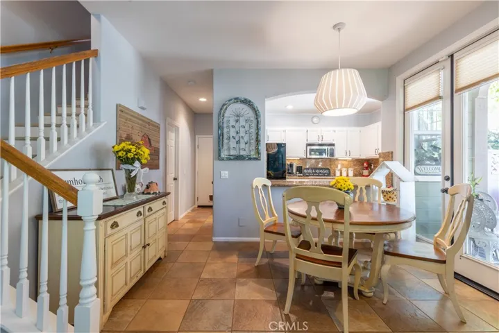 Lots of dining options in this design. Breakfast nook with french doors that open to al fresco dining on the porch and counter bar seating