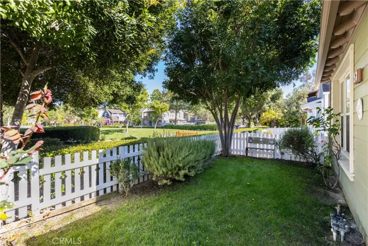 Home is located on the largest greenbelt in Surrey Farm. It is situated on a corner lot and is surrounded by mature shade trees for added privacy