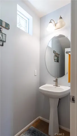 First level powder room with pedestal sink