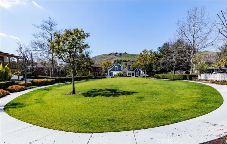 Uniquely designed neighborhood where homes are located on greenbelts and have white picket fences.