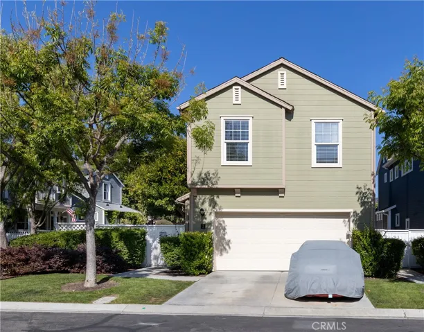 Corner lot home with an extra yard space that is maintained by the HOA