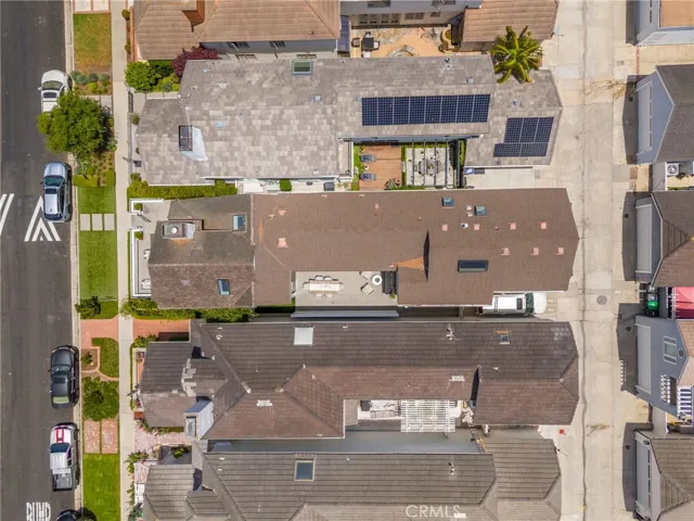 Two outdoor patios and parking for three cars