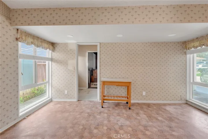 Could be Family Room off of Kitchen-Leads to Interior Laundry Room, Storage Room and 2 Car Garage