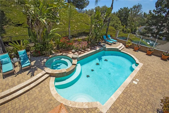 Gorgeous salt water pool and heated spa, paver patio, and of course, the view