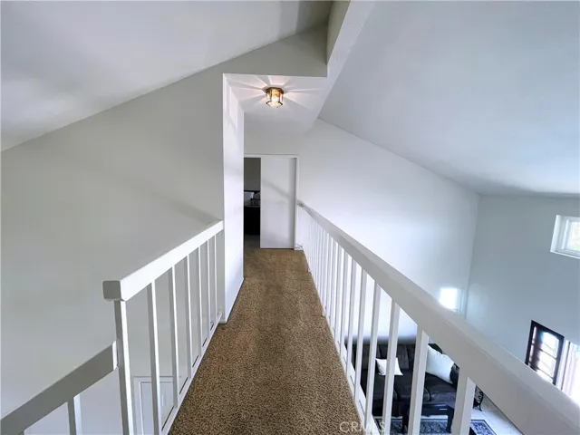Master Bedroom separated by a hallway to the other two bedrooms