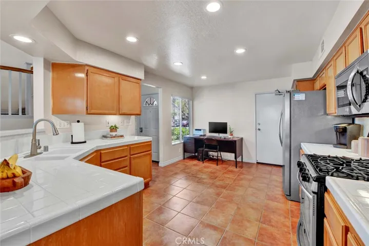 Kitchen insludes breakfast nook (was used as a desk/office area). Access to 2 car garage
