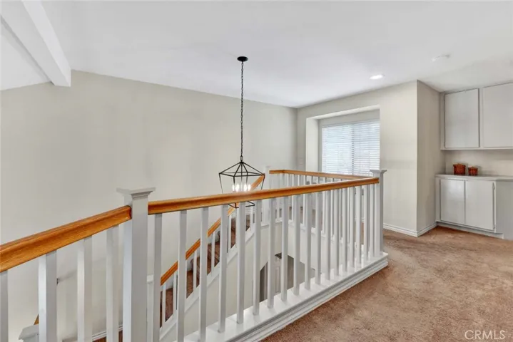 Window seat located at top of stairs