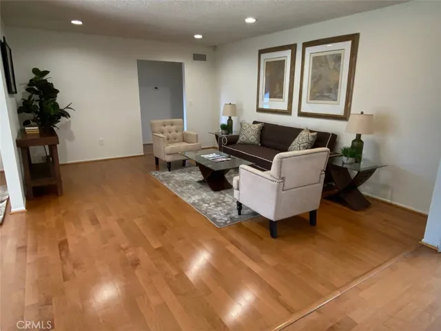 Living Room. Recessed Lighting. Wood Floors