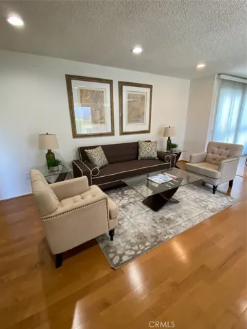 Living Room. Recessed Lighting. Wood floors