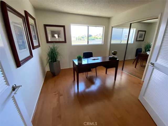 Bedroom#1 Staged as Office.  New Mirrored Closets