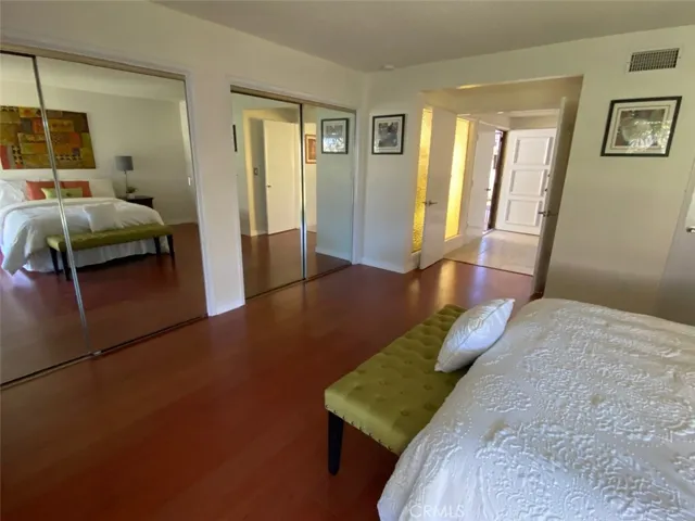Master Bedroom with Double Mirrored Closets