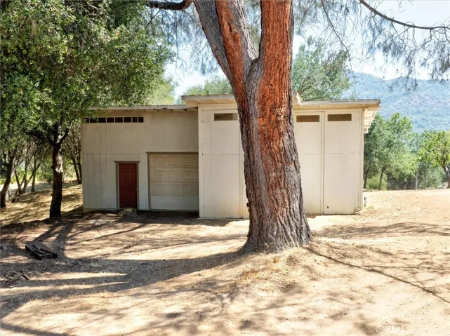 The 1200 square foot barn has parking for a 35 foot RV, has 3 1/2 bays will hold up to six cars, has a loft and tons of room for sitting and parts storage. This can be a man/woman cave.