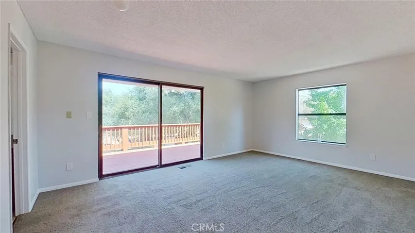 Master bedroom has a slider 5to the rear deck