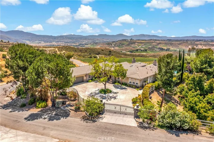 Aerial of front w views beyond