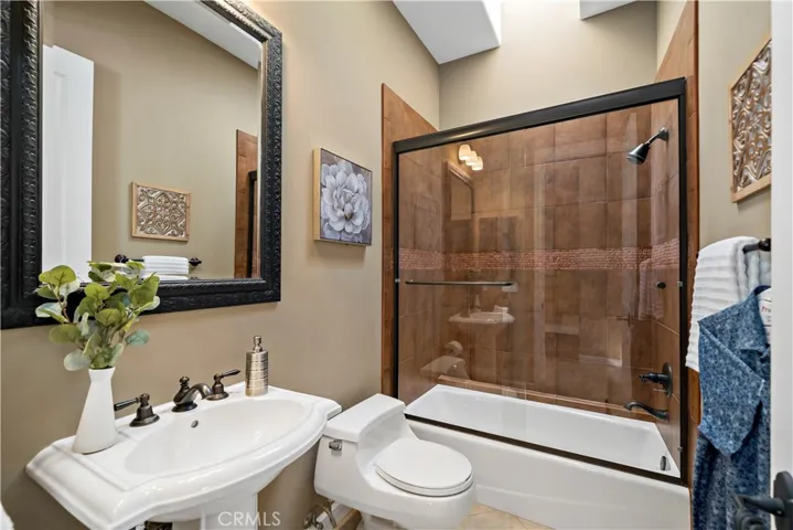 Full bath down the hall from the 4th bedroom/home theater room