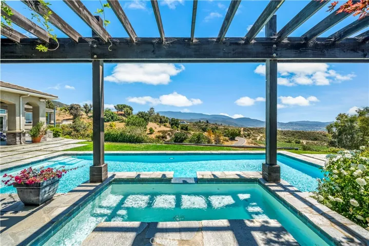 Pool and spa area w views
