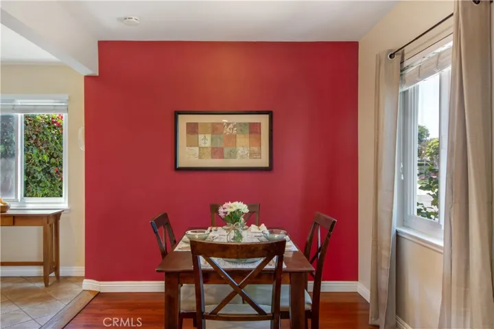Dining space right off of cute kitchen, large window facing beautiful front yard and mature magnolia tree.