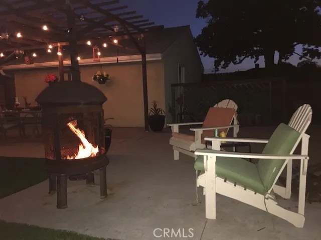 Slide up some chairs to your fire pit and enjoy the warmth and ambiance in your private back yard.