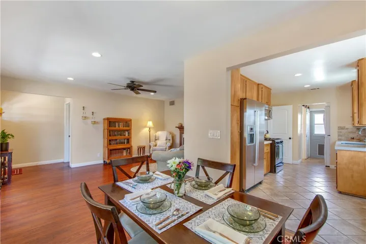 View of dining, living and entry to your cute kitchen.