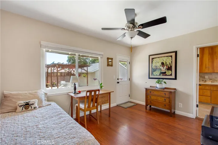 View of 3rd bedroom facing back yard and to your right access door into laundry room.