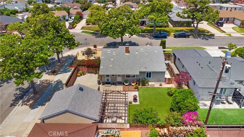 Aerial view of the home and corner lot.