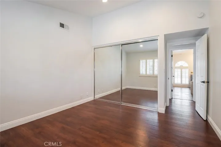 Bedroom 1 has mirrored closets