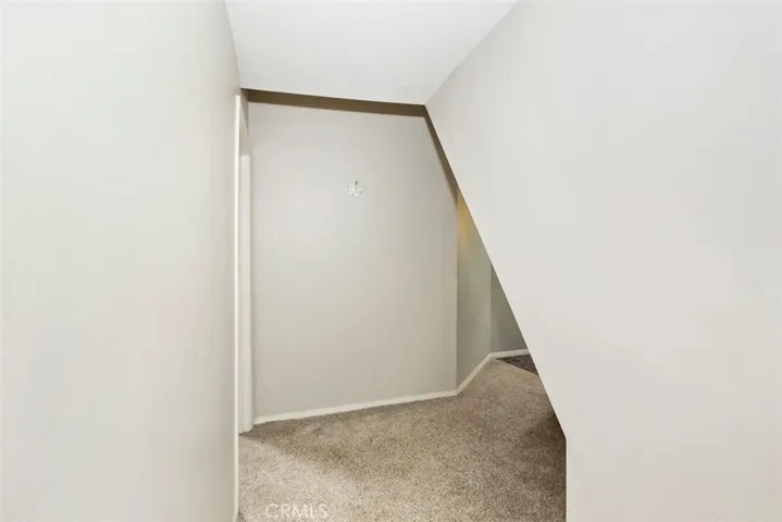 Hall way from Master/primary suite to master bath