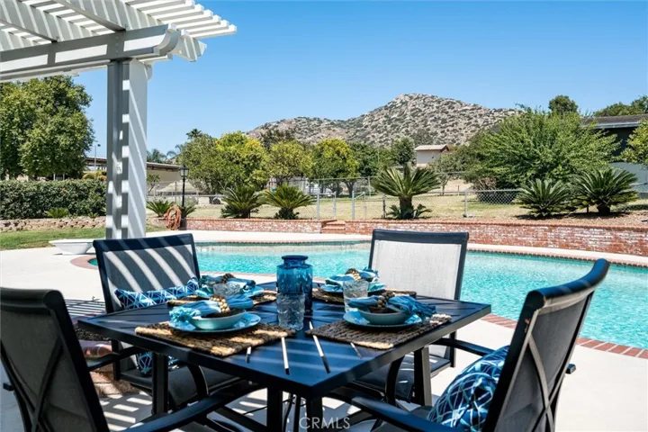 Entertainer's backyard with sparkling pool and lots of room for family and friends.
