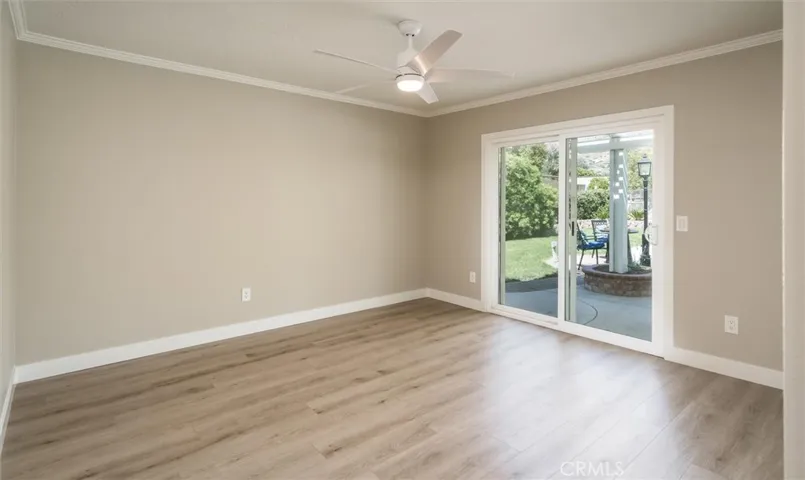 Bedroom #3 with slider access to the pool area.