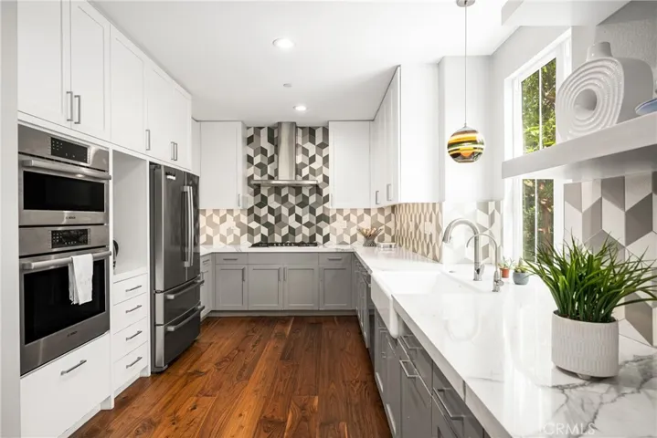 Premium counters and backsplash, Upgraded Bosch appliances.