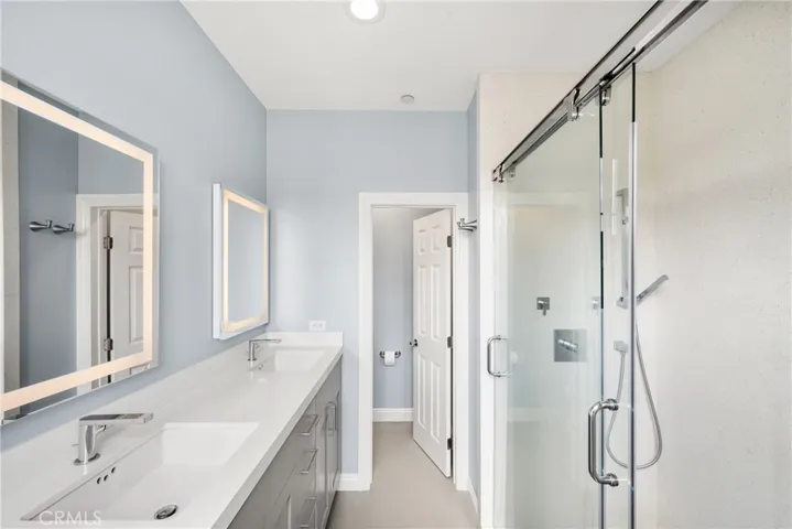 Primary Bathroom, walk in shower, double sink fully remodeled.