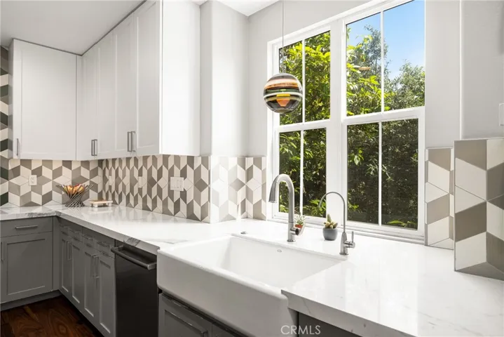 Farm sink with great view of trees