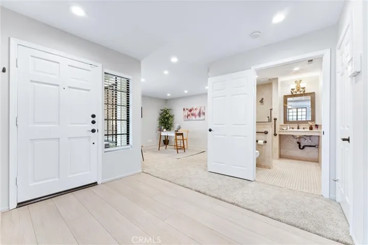 Downstairs office (could be 4th bedroom) with an adjacent 3/4 bath