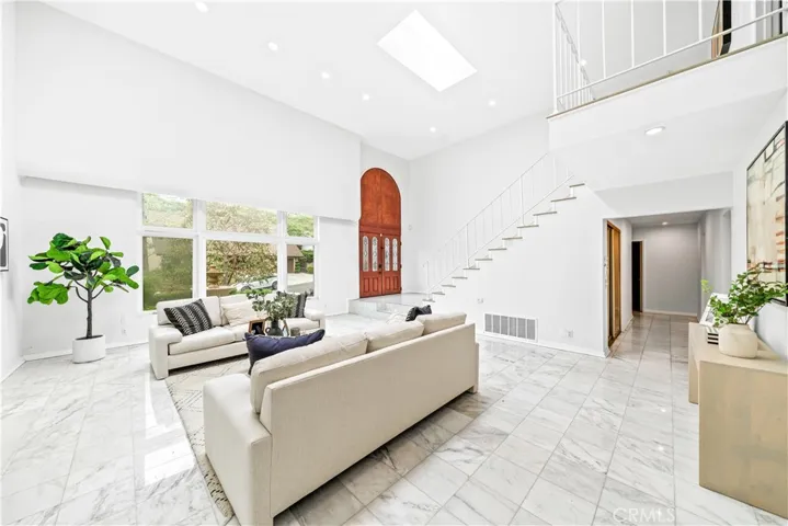 Notice the natural lighting and high ceilings.